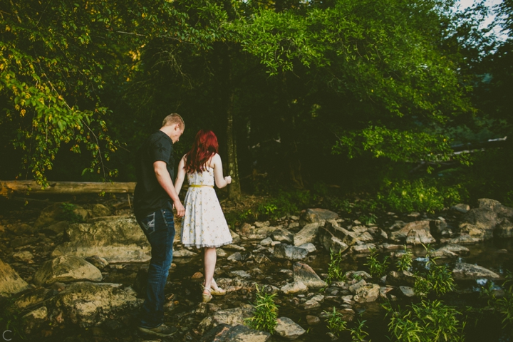Couple walking in river